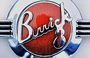   Original 1936 Buick 8 Champlev&eacute; Emblem with an obliterated detail removed during one plater’s idea of a &ldquo;repair.&rdquo;